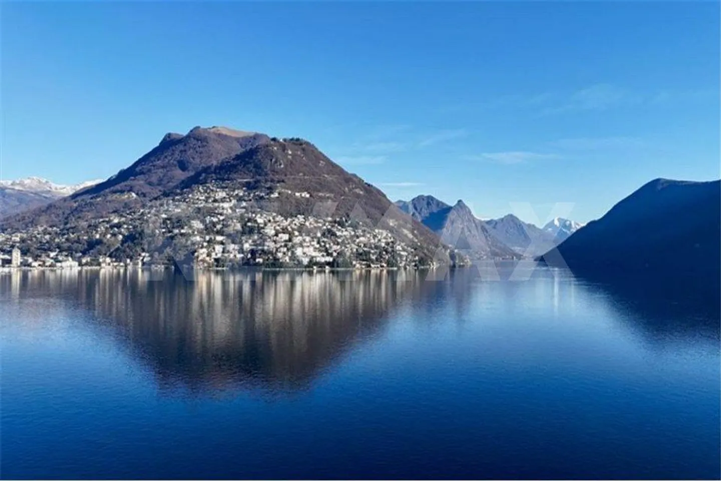 Attico elegante con vista libera sul lago di Lugano / Seconda casa - Foto 3 di 13