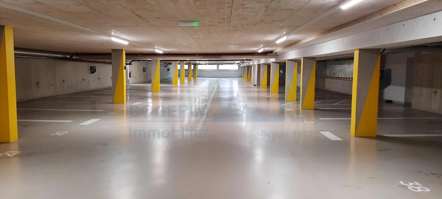 Place de parking extérieure à louer - Photo 2 sur 2