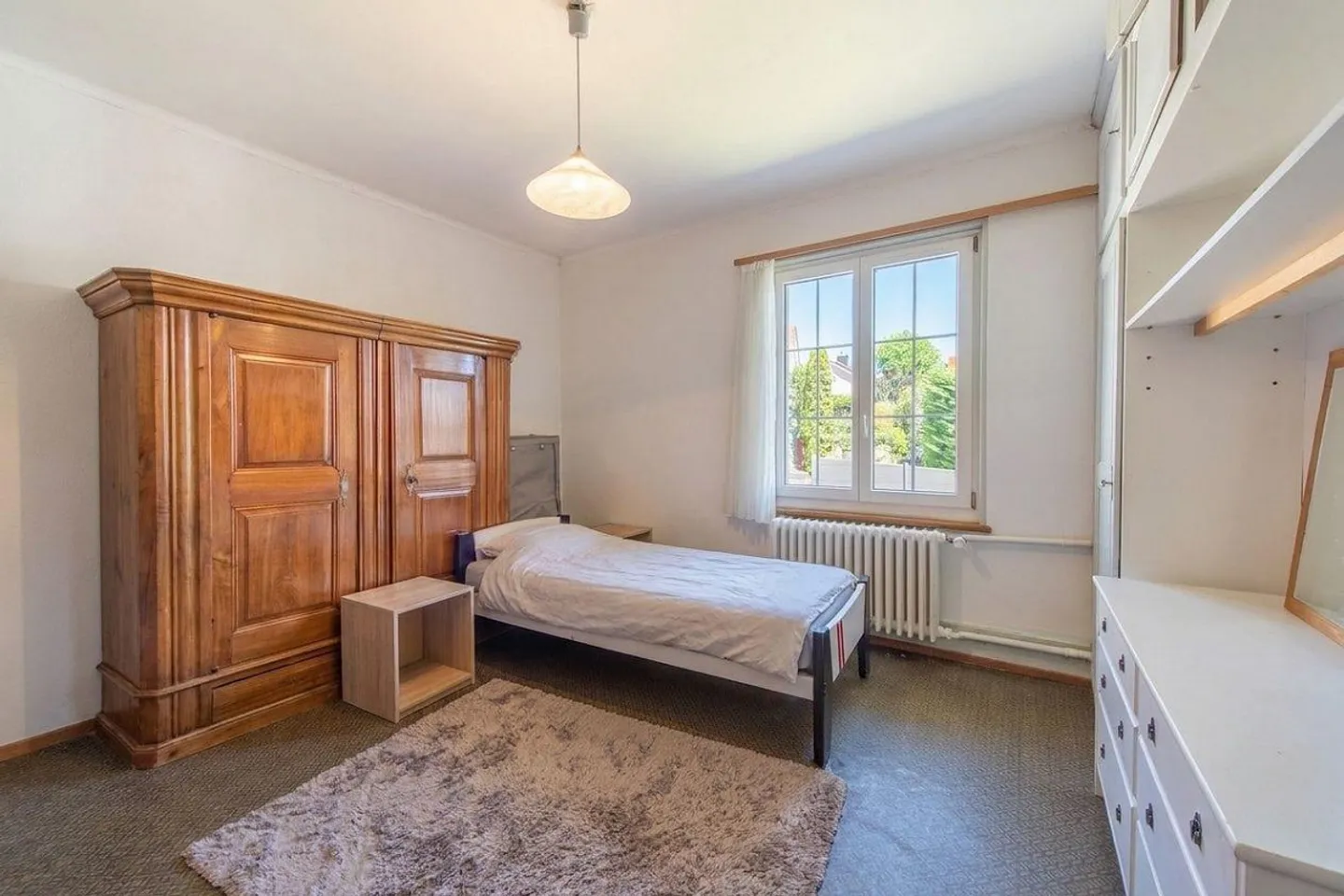 Vielseitiges Zweifamilienhaus mit Garten - Foto 8 von 13