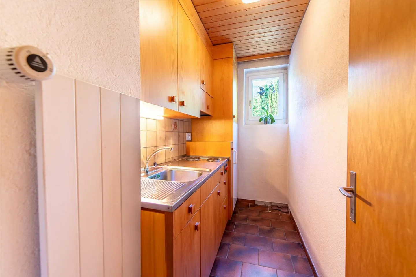 Vielseitiges Zweifamilienhaus mit Garten - Foto 13 von 13