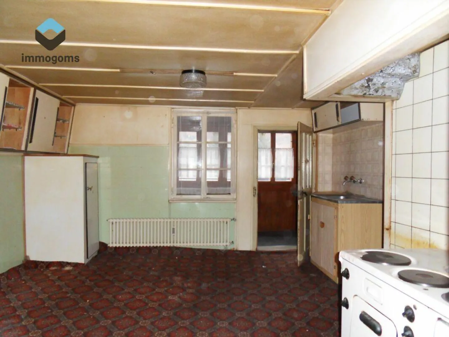 Casa con tre appartamenti in una posizione centrale - Foto 5 di 10