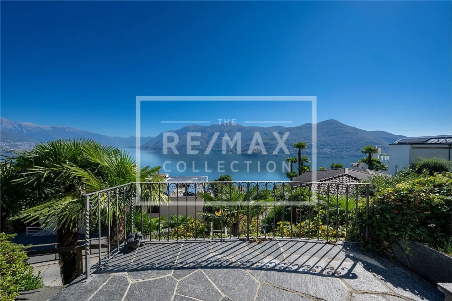 Villa mit unverbaubarem Seeblick - Foto 1 von 4