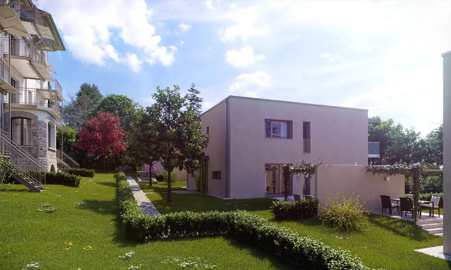 Villa contigua contemporanea in un ampio parco alberato - Foto 2 di 4