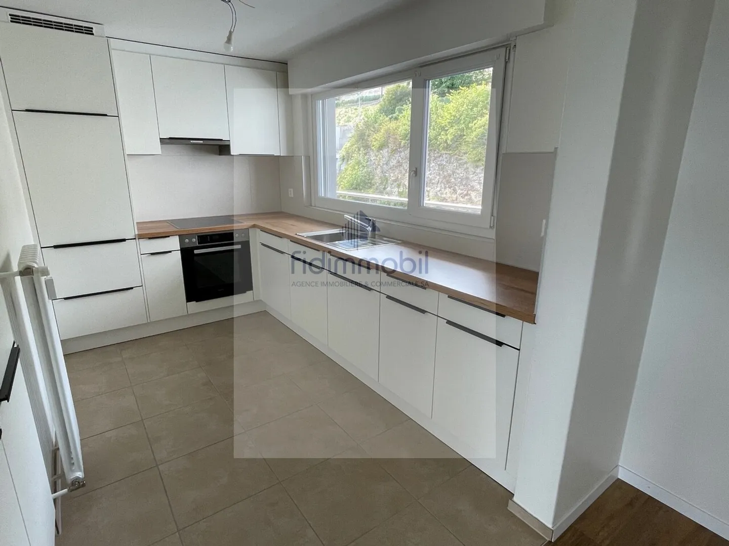 Magnifico appartamento di 3,5 locali completamente ristrutturato a Hauterive - Foto 1 di 7