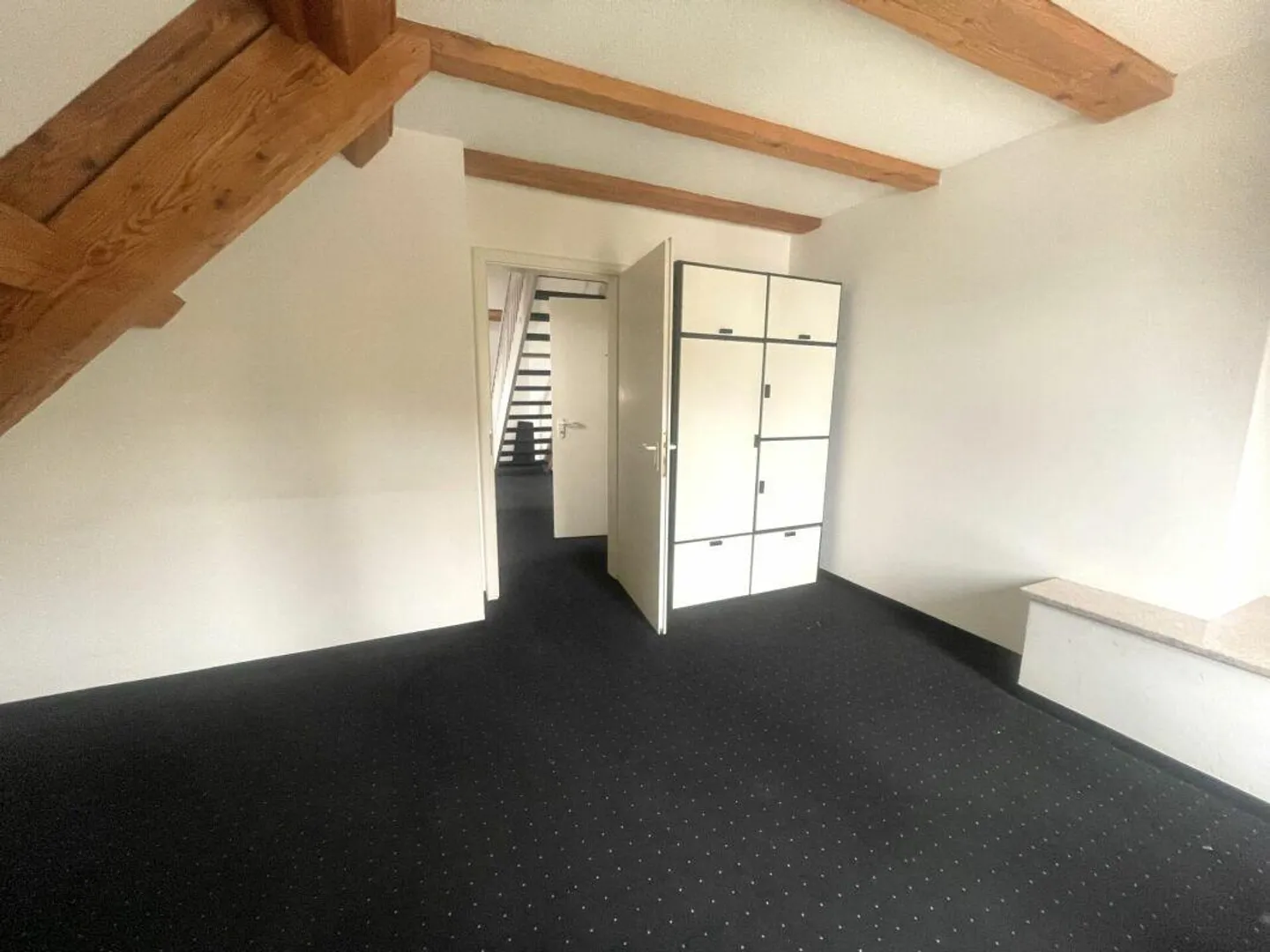 Charming commercial space with loft character and bright daylight - Photo 5 of 9