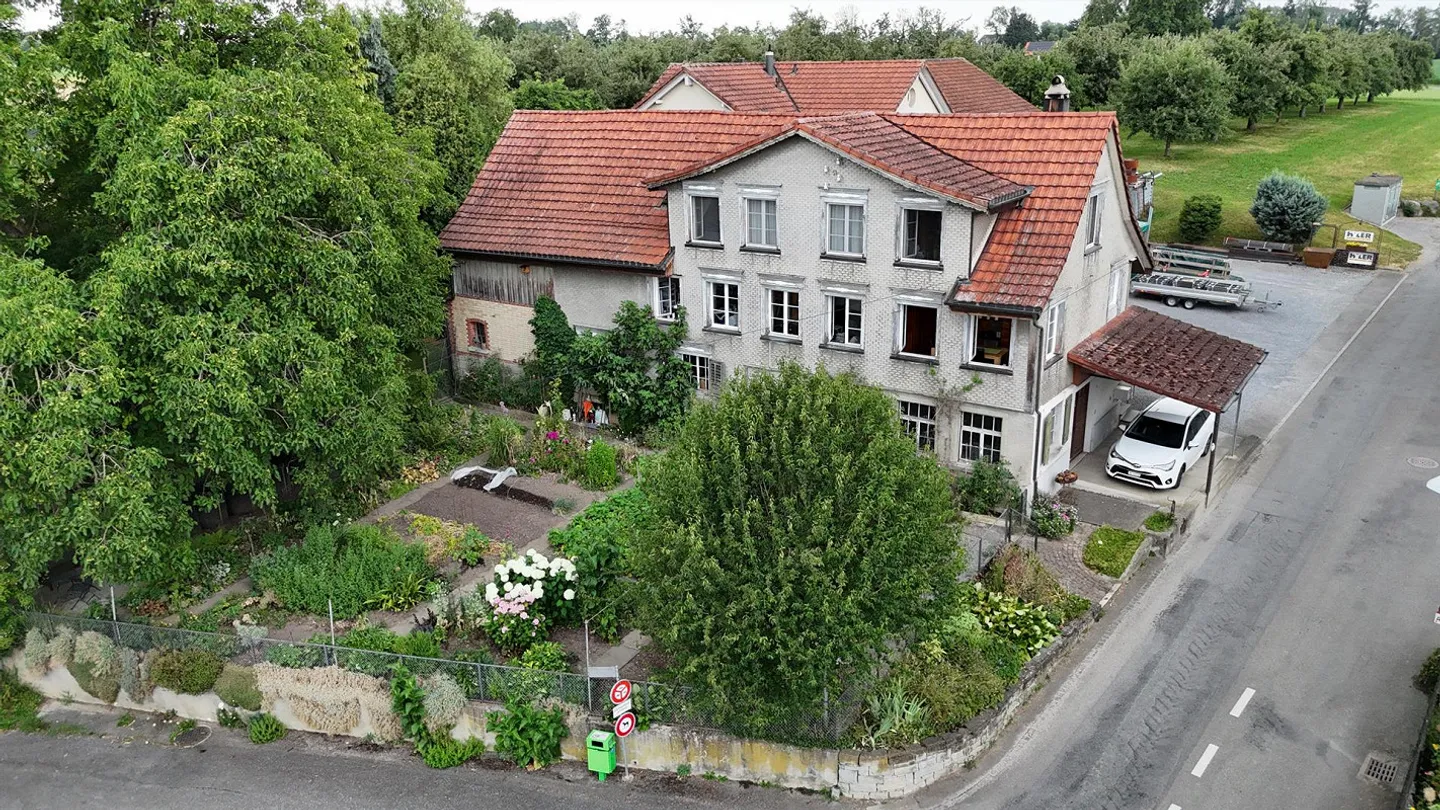 Wohnhaus und Gewerbeliegenschaft - Foto 1 von 23