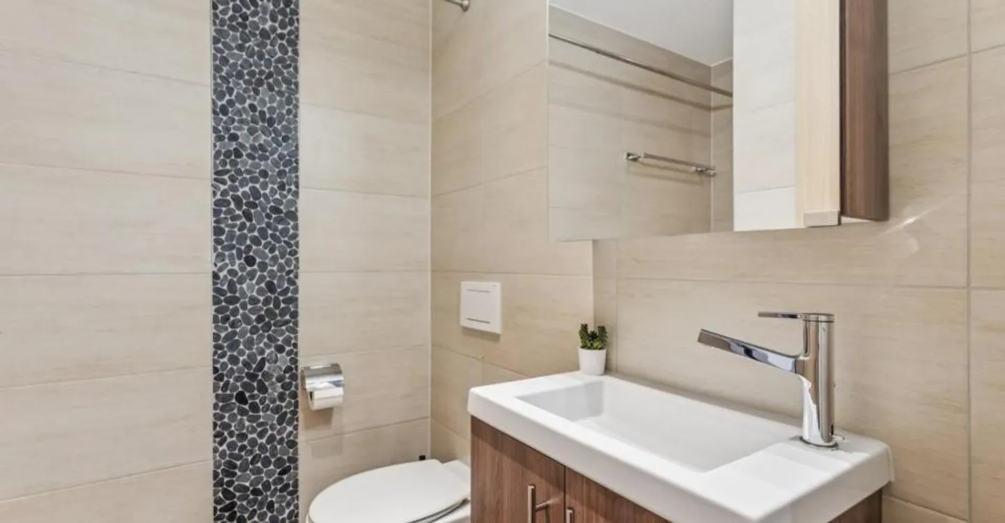 Appartement spacieux avec jardin - Photo 11 sur 12