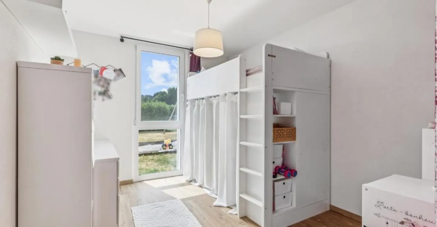 Appartement spacieux avec jardin - Photo 10 sur 12