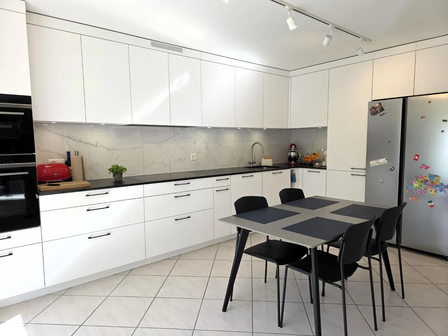 Appartement spacieux avec jardin - Photo 4 sur 10