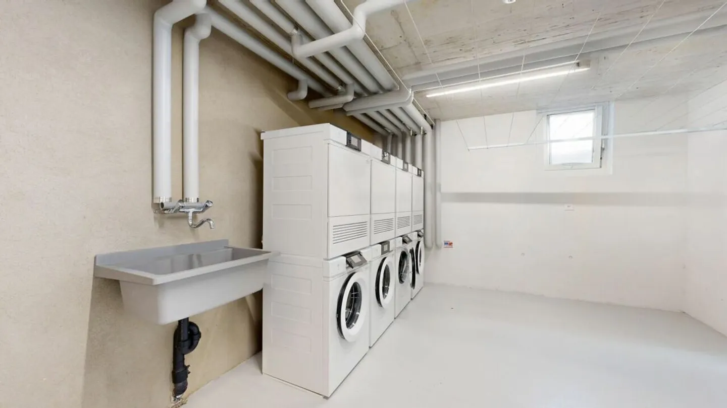 Appartamento moderno di 3,5 locali con torre di lavaggio privata e carport - Foto 11 di 17