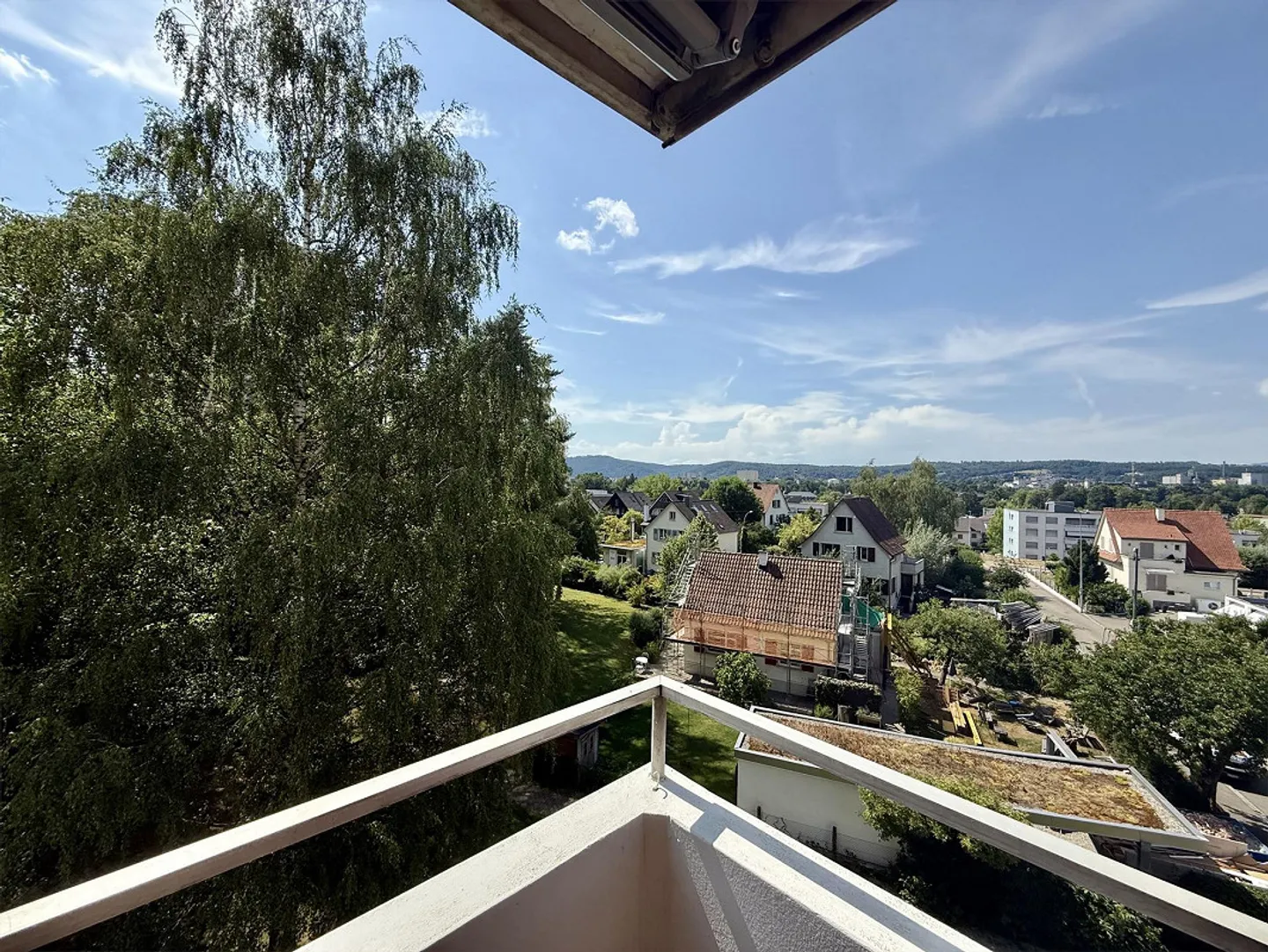 LIVING WITH A VIEW OVER THE ROOFS OF RHEINFELDEN - Photo 2 of 11