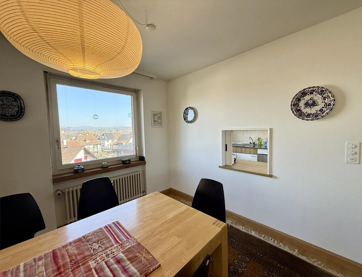 LIVING WITH A VIEW OVER THE ROOFS OF RHEINFELDEN - Photo 4 of 11
