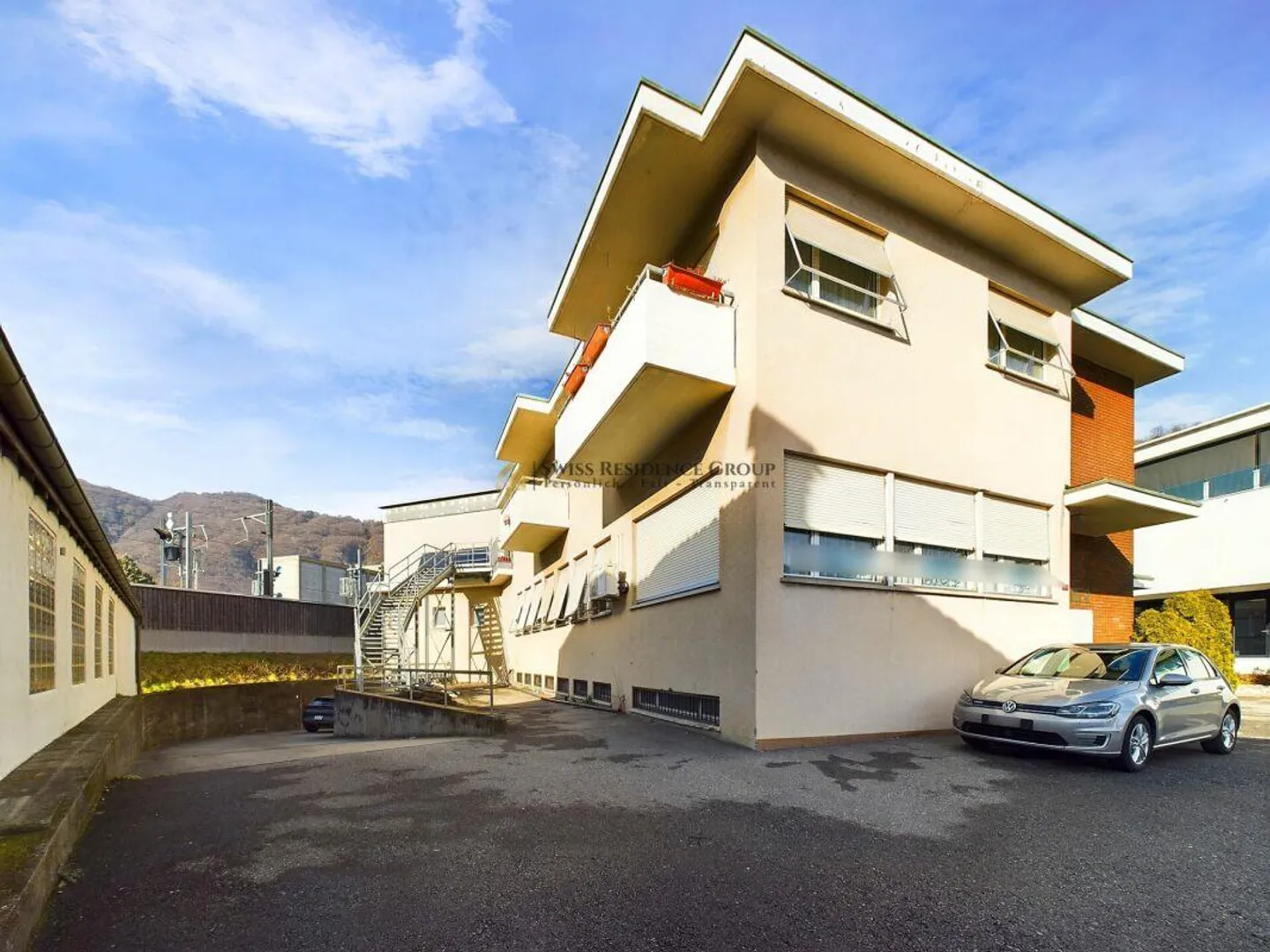 Proprietà residenziale e commerciale a Lamone - Punto forte di investimento in posizione ottimale! - Foto 3 di 8