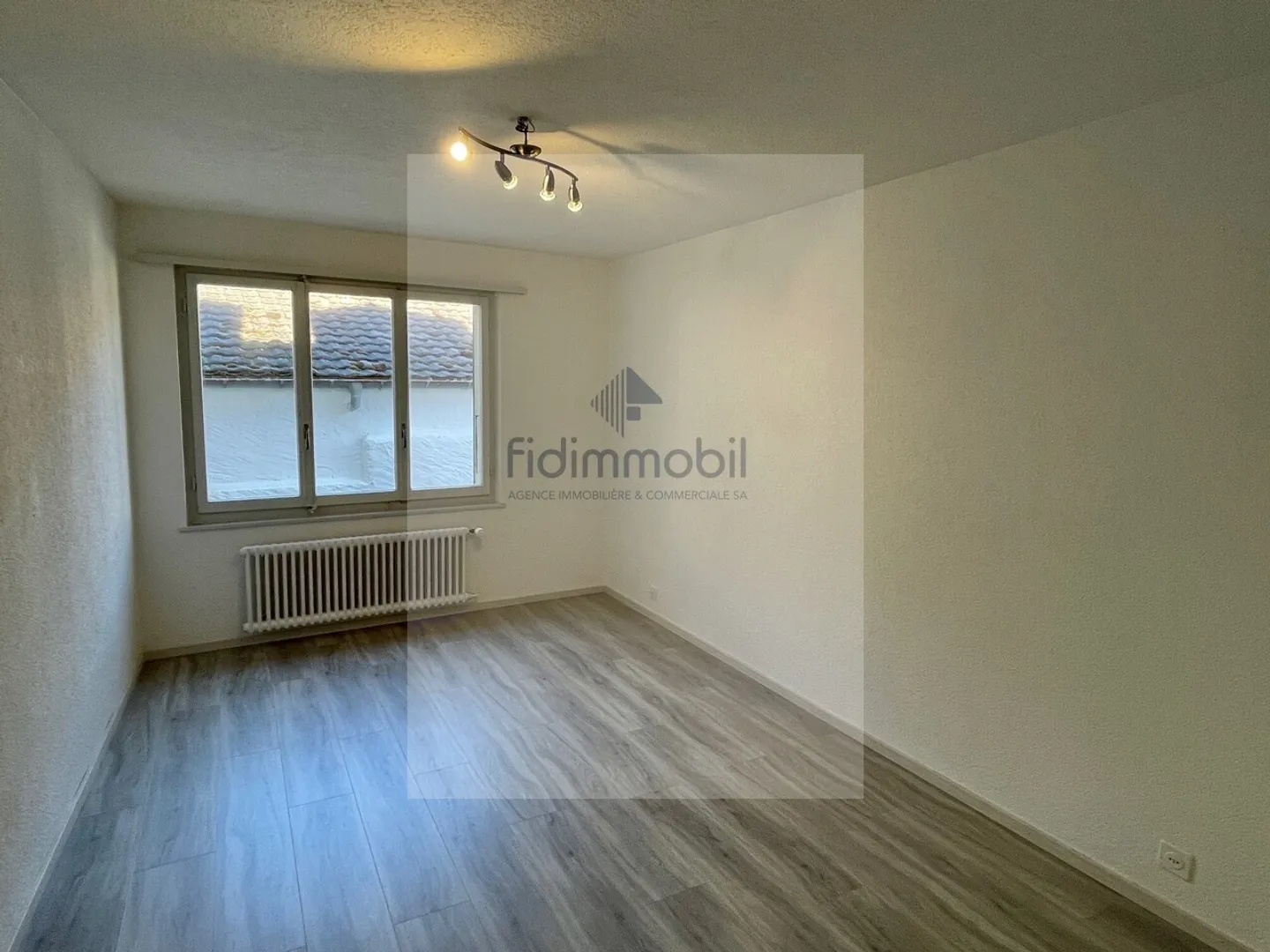2,5-Zimmer-Wohnung in Cornaux - Foto 1 von 5