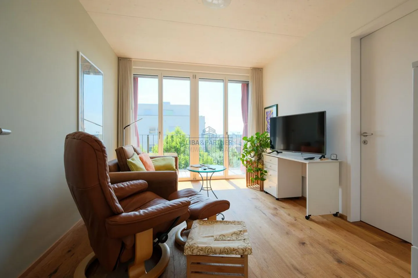 Attico con stile, grande terrazza e vista ampia - Foto 7 di 13