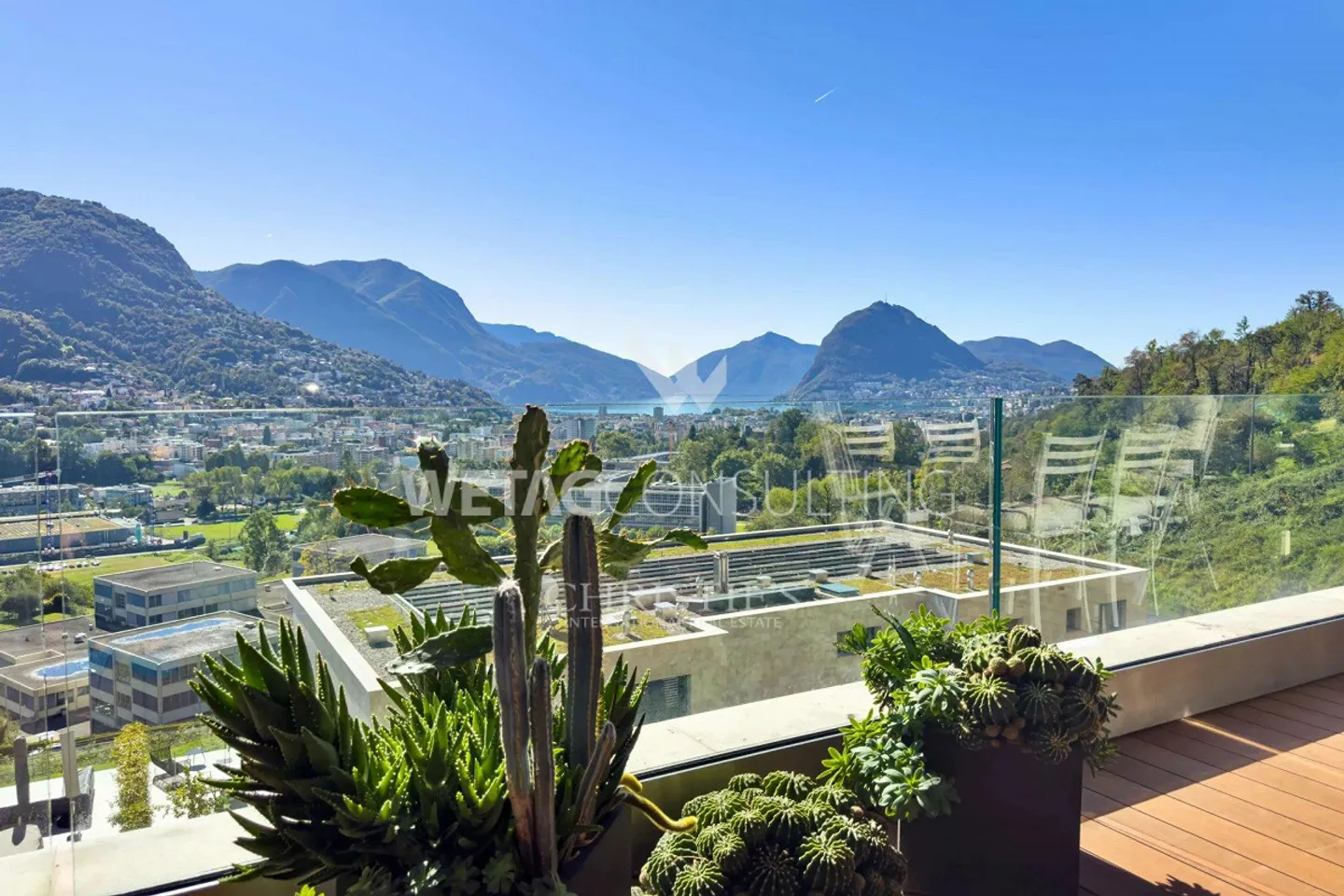 Lugano-Canobbio: Charmante Wohnung mit offenem Blick auf den Luganersee & privatem Garten, auch ideal als Zweitwohnsitz. - Foto 2 von 12