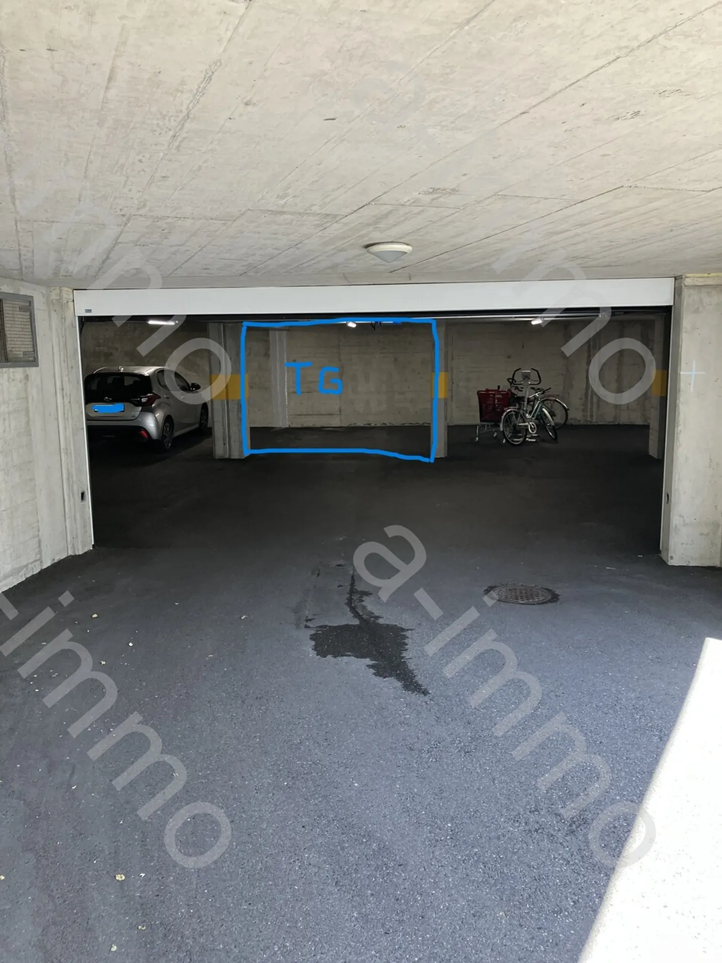 Spacious Garage Parking Space - Photo 2 of 8