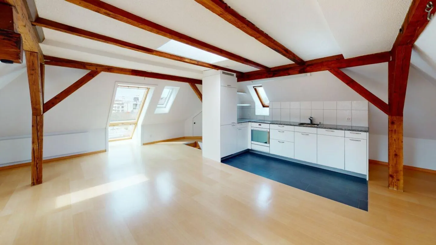 Appartement en duplex de 2 chambres sous le toit - Photo 2 sur 7