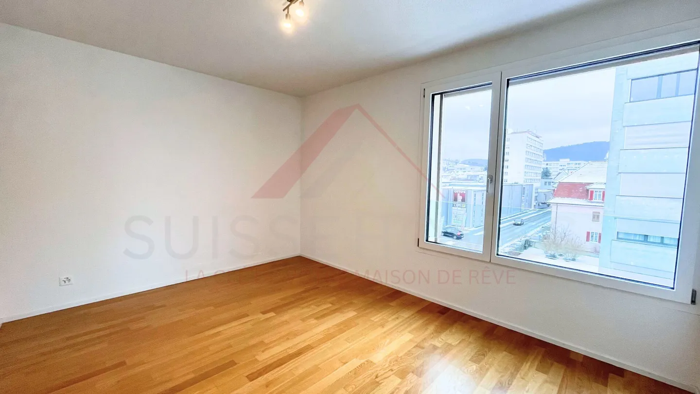 Hyper-center of Delémont - Recent and bright 4.5 rooms of 120 m² with a view - Photo 12 of 19