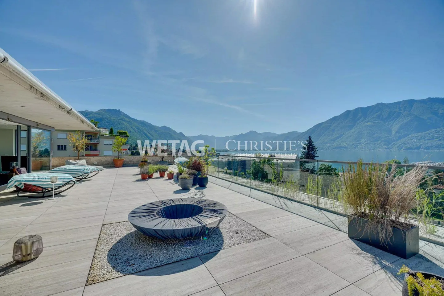 Appartement penthouse lumineux et exclusif avec grande terrasse et vue panoramique à vendre à Locarno - Photo 1 sur 13