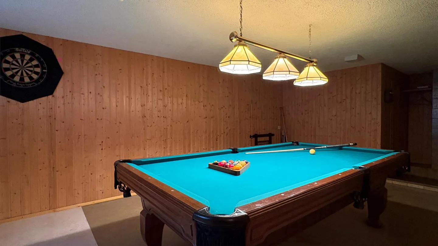 Detached Single-Family Home with Scenic Views and Expansion Potential - Photo 11 of 16