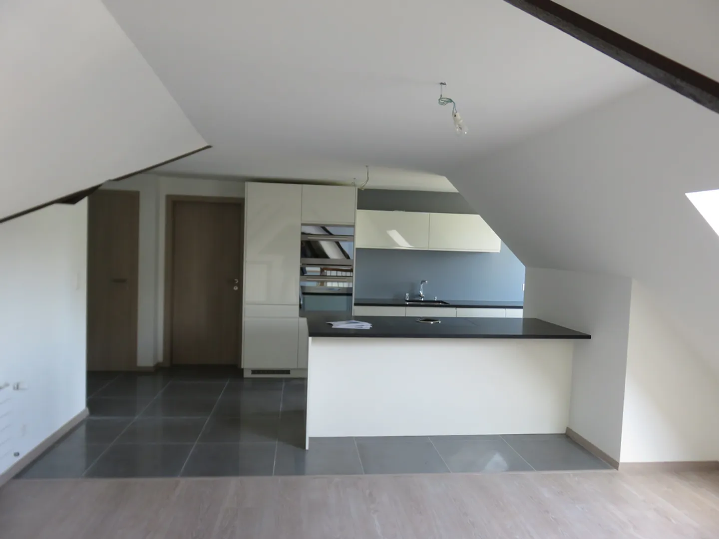 Charmant Appartement Sous Les Combles - Photo 3 sur 6
