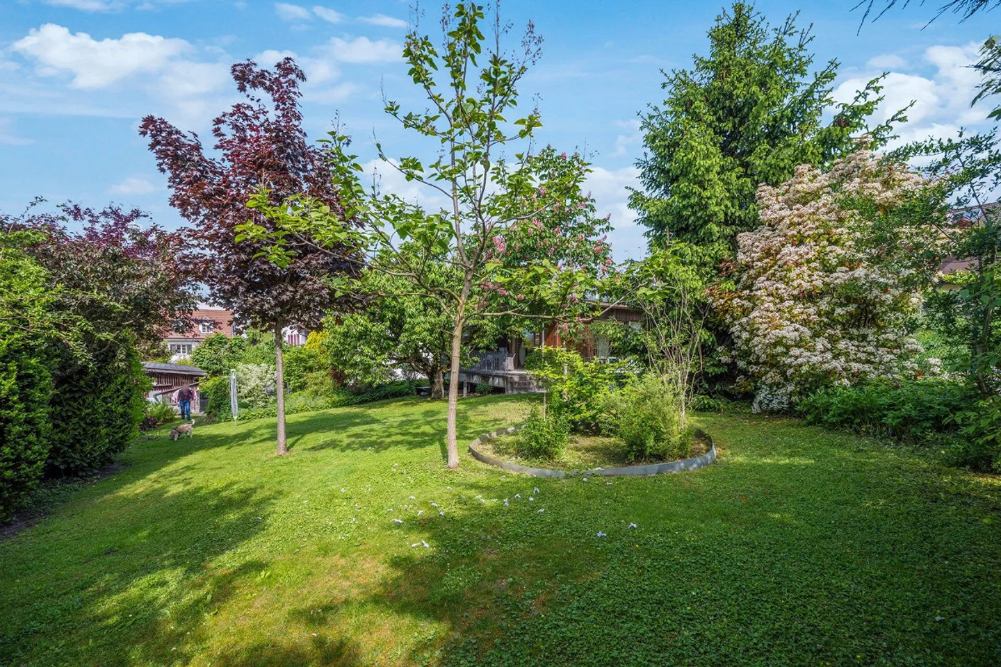 Propriété attrayante avec trois unités résidentielles et jardin bien entretenu - Photo 11 sur 13