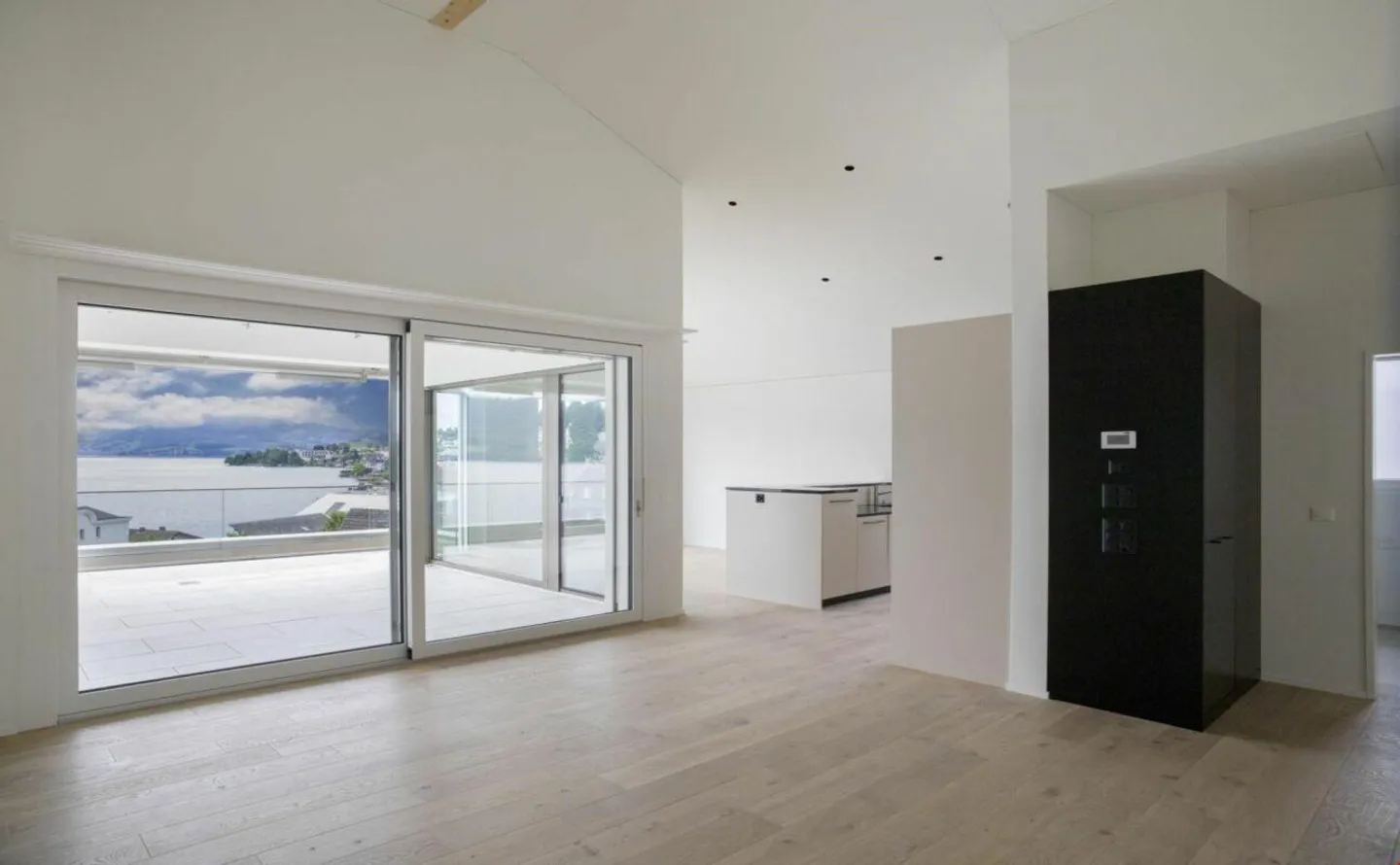 Exklusive Penthousewohnung mit See- und Bergsicht - Foto 4 von 12