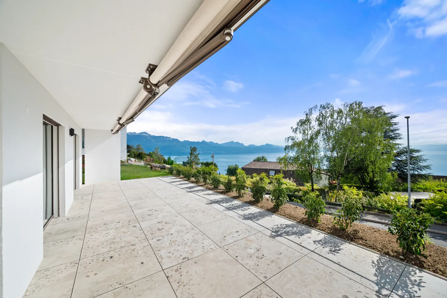 New | Terrace & garden with lake view - Photo 1 of 14