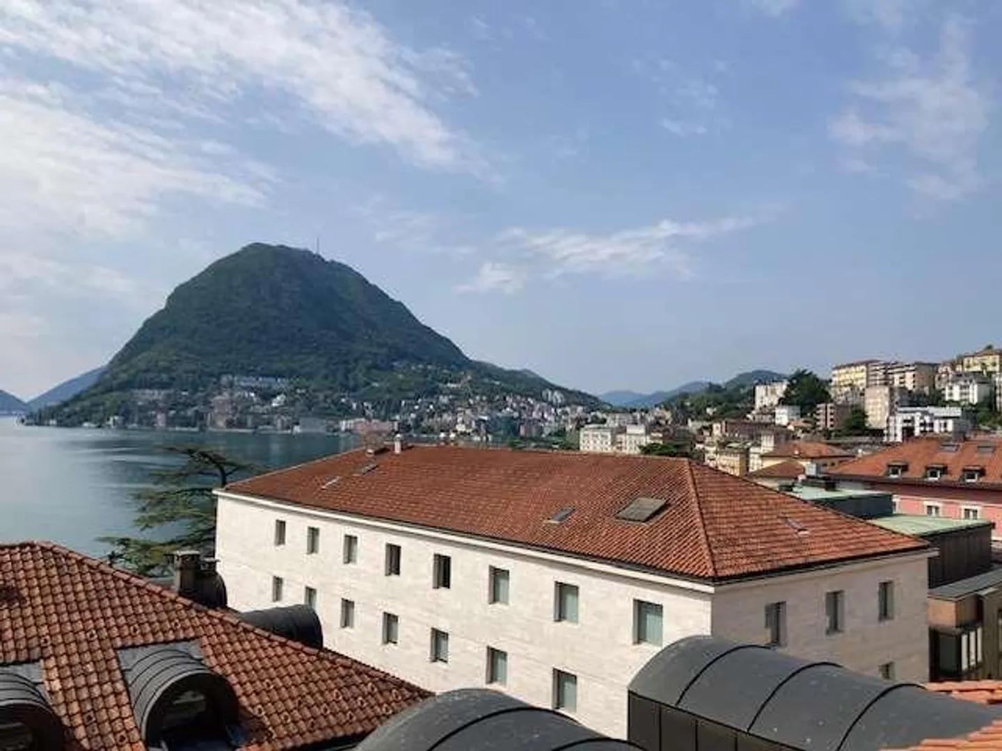 LUGANO : PENTHOUSE PRESTIGIEUX AU CENTRE - Photo 2 sur 13