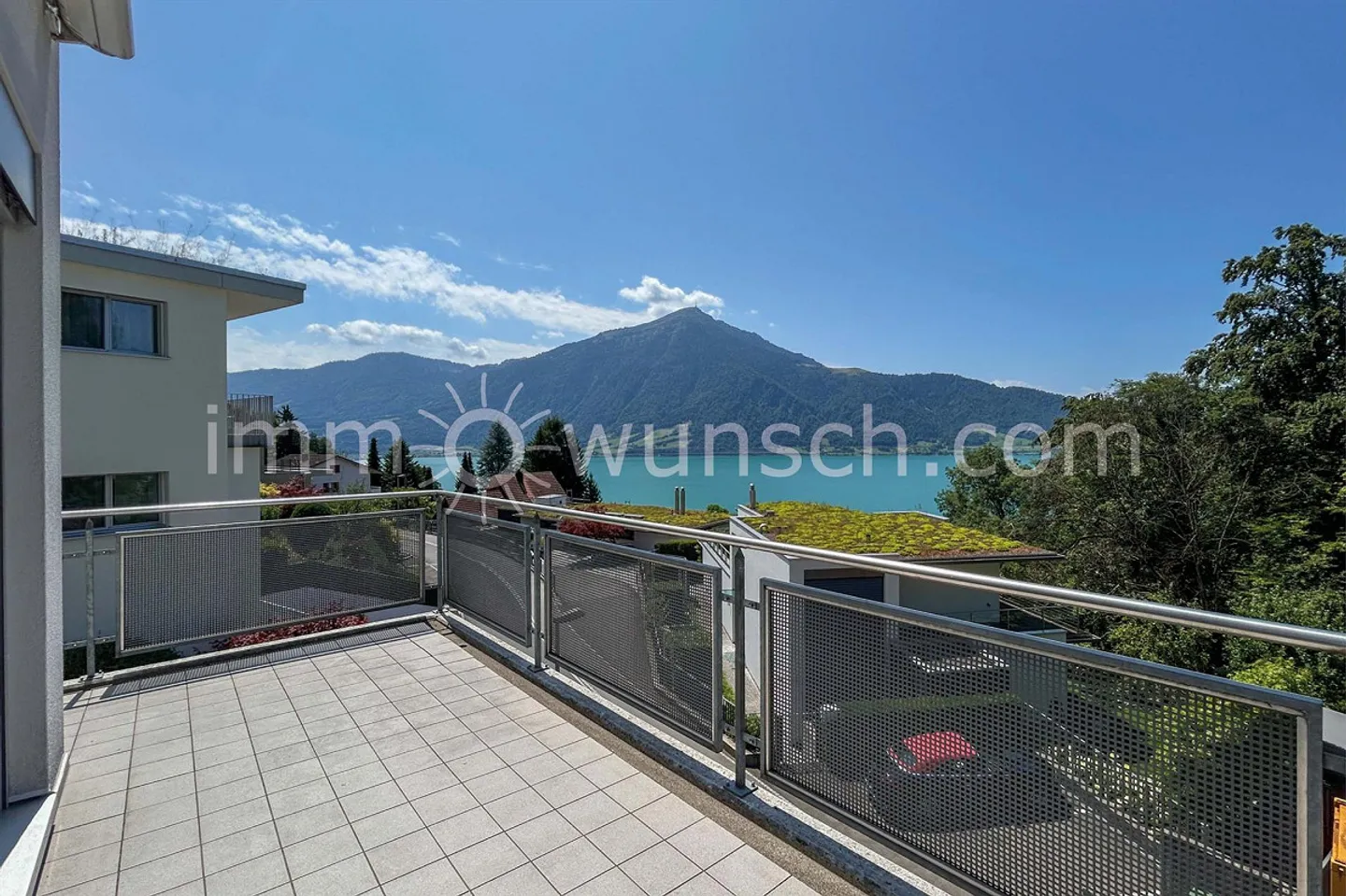 Exclusive 4 ½ room EGTW with breathtaking lake view in Walchwil - Photo 1 of 11