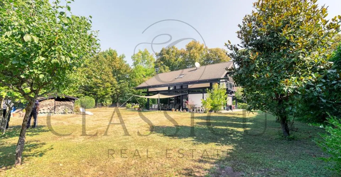 Villa luminosa e moderna con giardino paesaggistico, ai margini del Golf di Ginevra - Foto 1 di 5