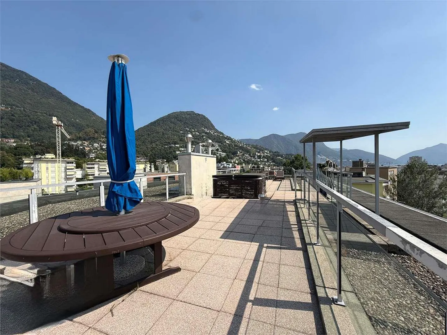 Modern penthouse with large outdoor space and rooftop in Lugano - Photo 1 of 6