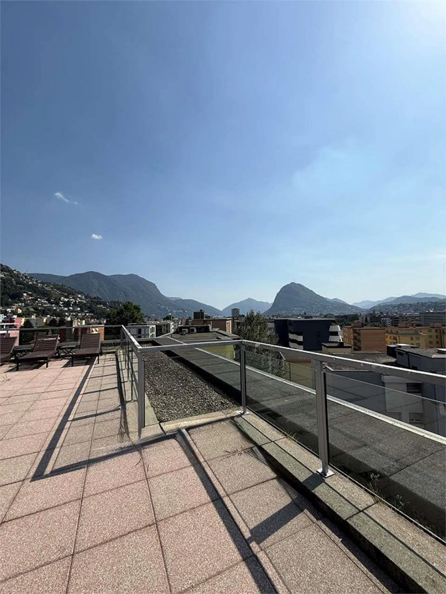 Modern penthouse with large outdoor space and rooftop in Lugano - Photo 2 of 6