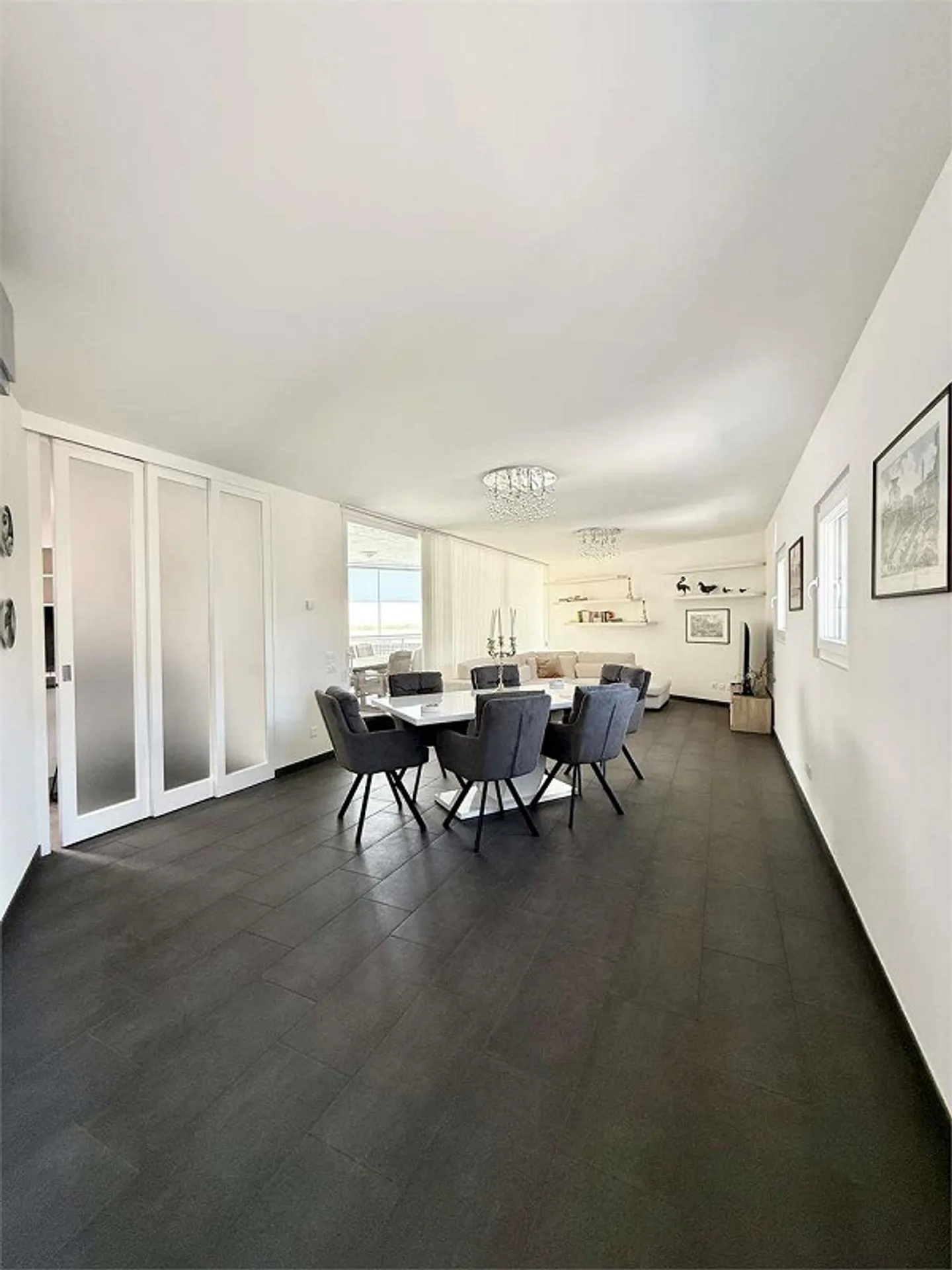 Modern penthouse with large outdoor space and rooftop in Lugano - Photo 3 of 6