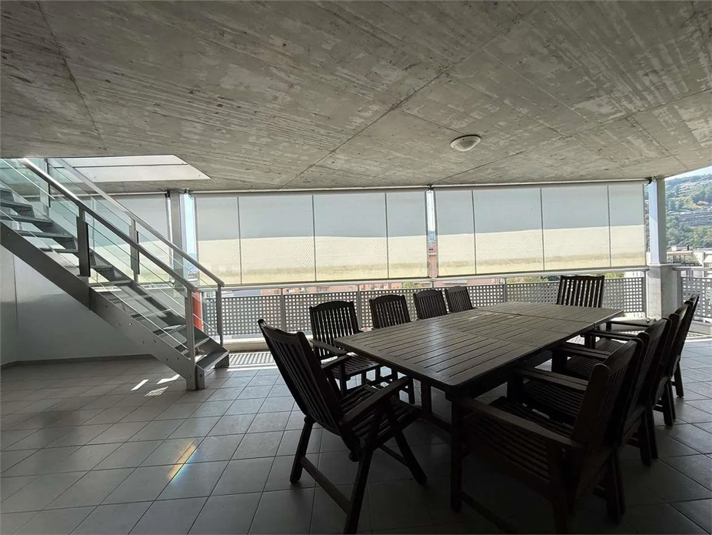 Modern penthouse with large outdoor space and rooftop in Lugano - Photo 4 of 6