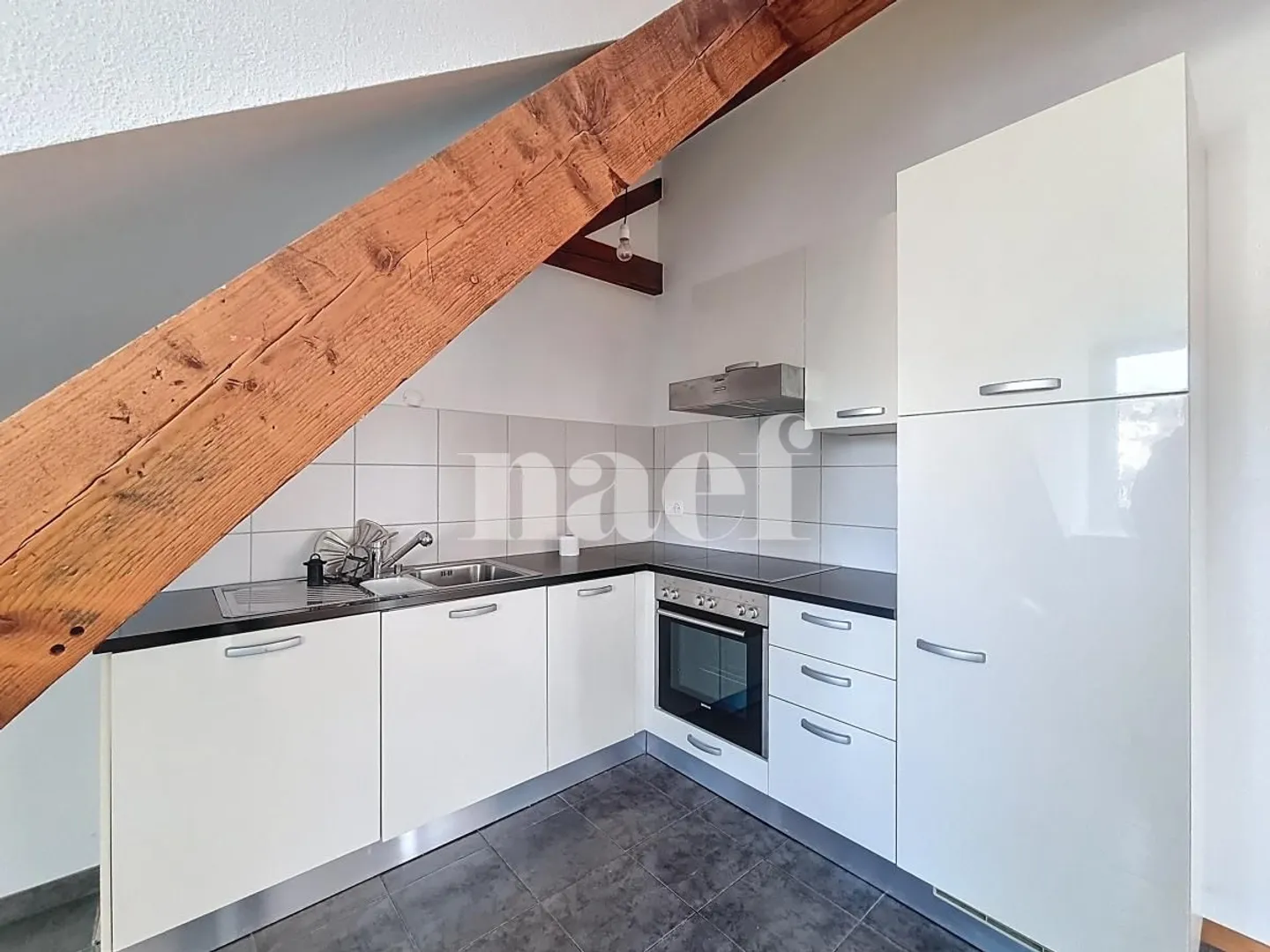Appartamento affascinante di 2,5 locali in mansarda - Foto 4 di 12