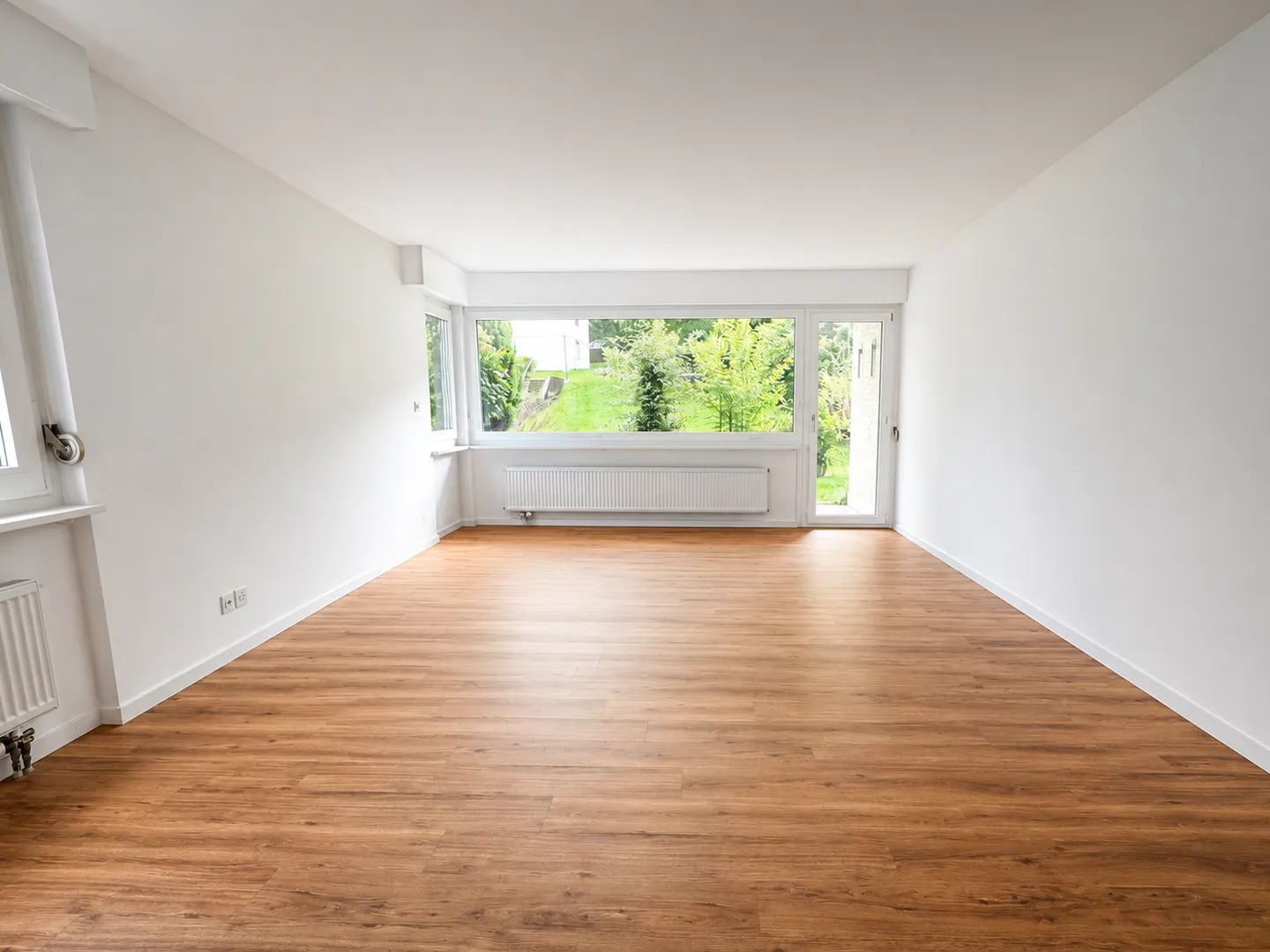 Helle 3.5 Zimmerwohnung im EG - Foto 2 von 9