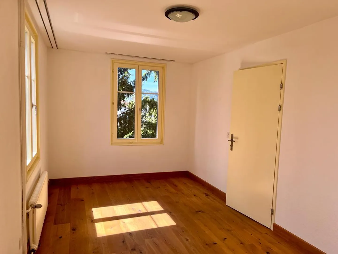 Sonnige 4-Zimmer-Wohnung mit Balkon und schöner Aussicht in St. Gallen - Foto 7 von 13