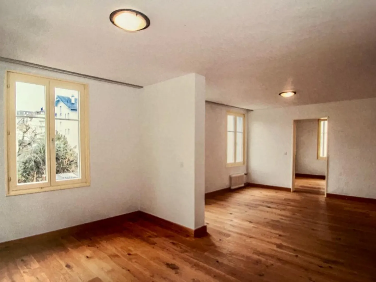 Sonnige 4-Zimmer-Wohnung mit Balkon und schöner Aussicht in St. Gallen - Foto 3 von 13