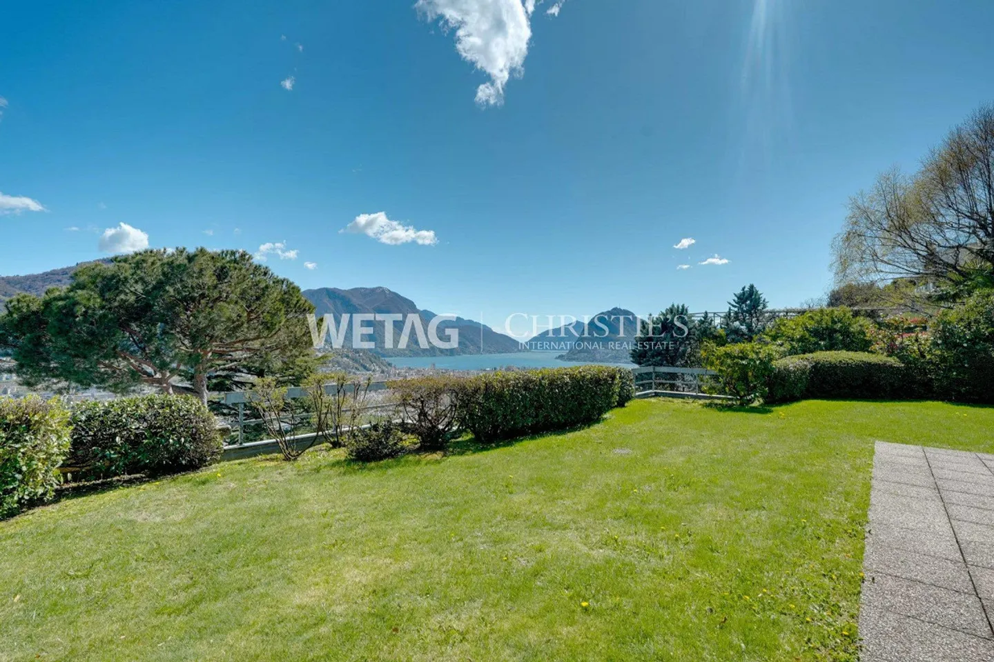 Elegant penthouse apartment in Lugano-Porza with private garden & balcony - Photo 1 of 13