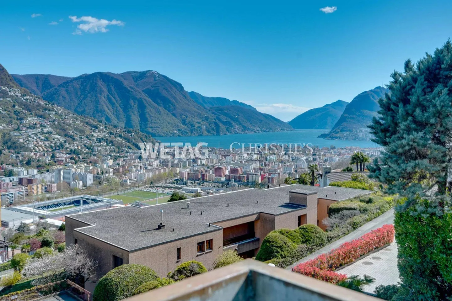 Elegant penthouse apartment in Lugano-Porza with private garden & balcony - Photo 2 of 13
