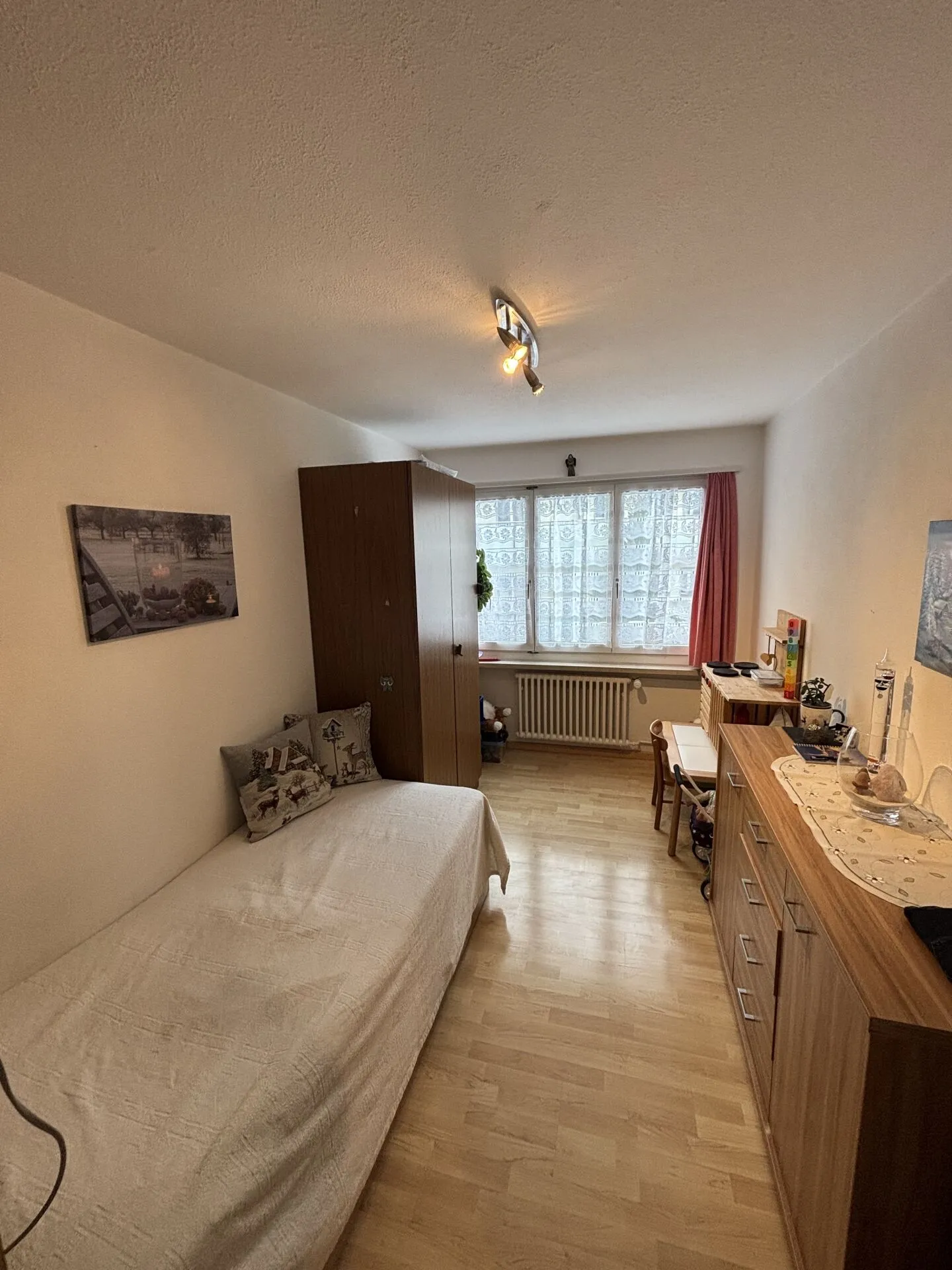 Appartement de 4 pièces au rez-de-chaussée surélevé - Photo 4 sur 7