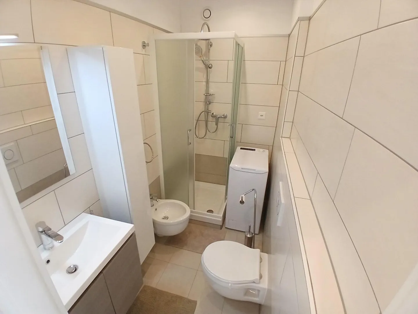 Second Home - RENOVATED STUDIO APARTMENT IN AGNO - Photo 9 of 9