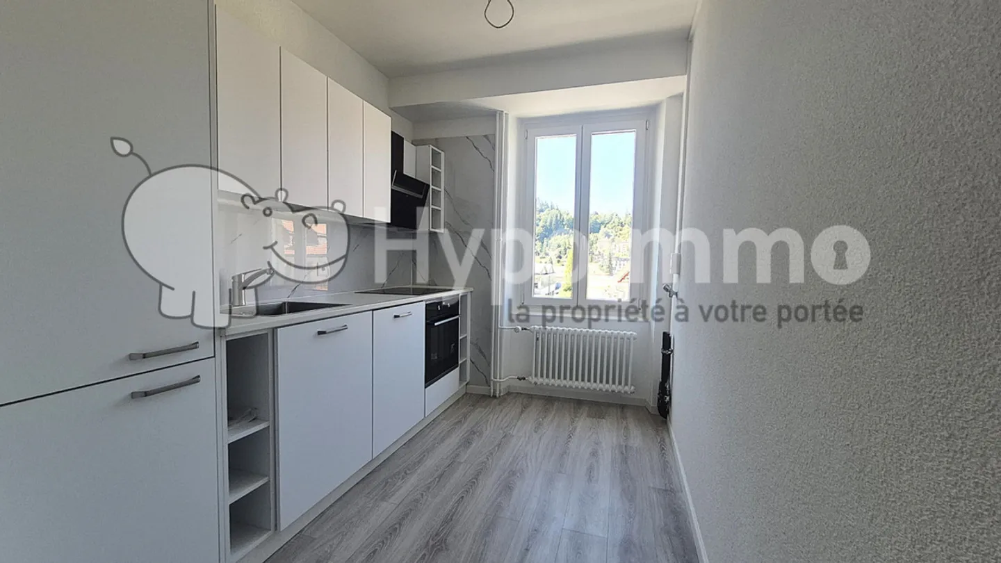 Magnificent 3-room apartment completely renovated with balcony - Le Locle - Photo 1 of 14