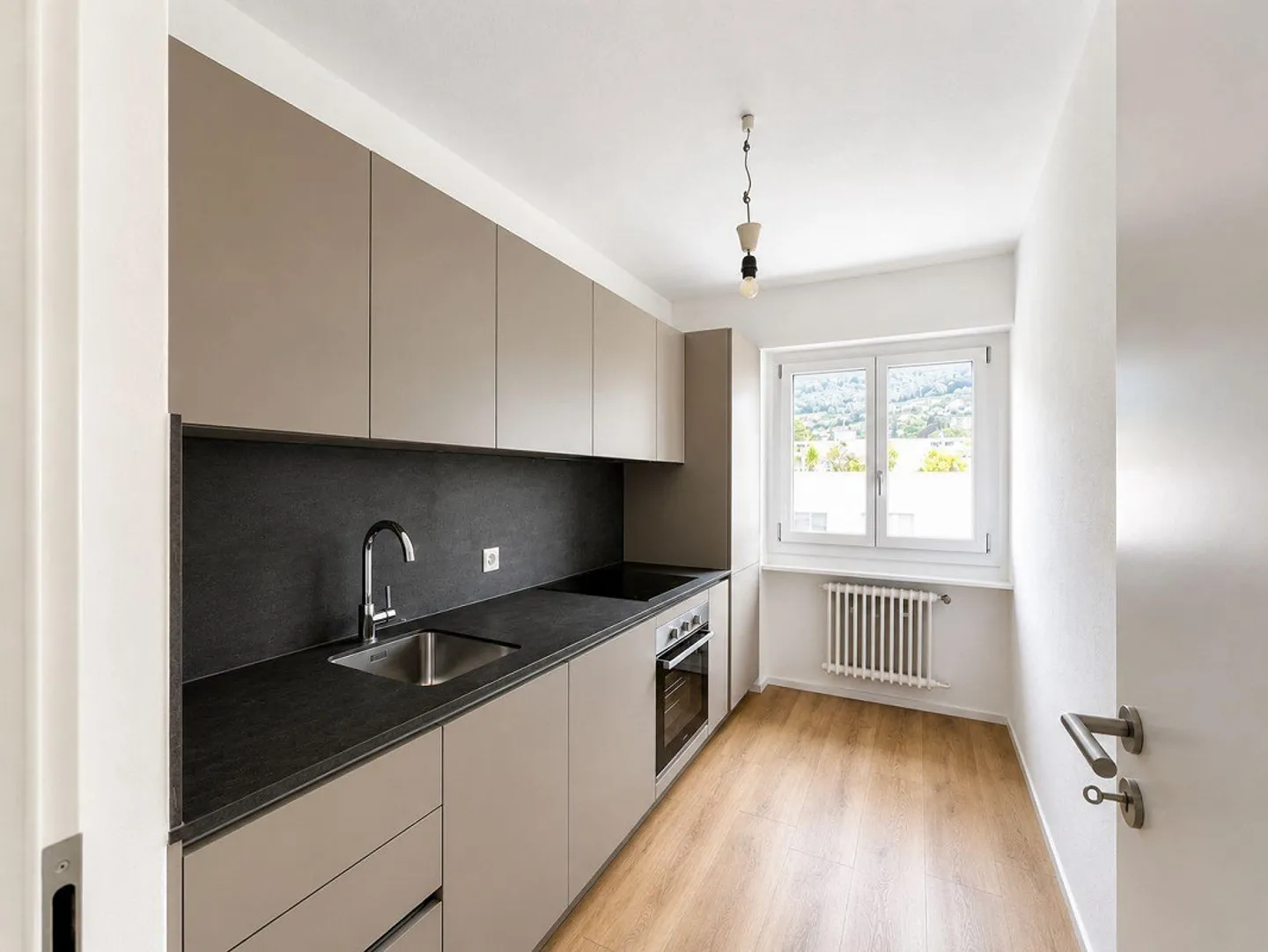 PREGASSONA - APPARTEMENT 2.5 CHAMBRES AVEC TERRASSE À LOUER - Photo 1 sur 6
