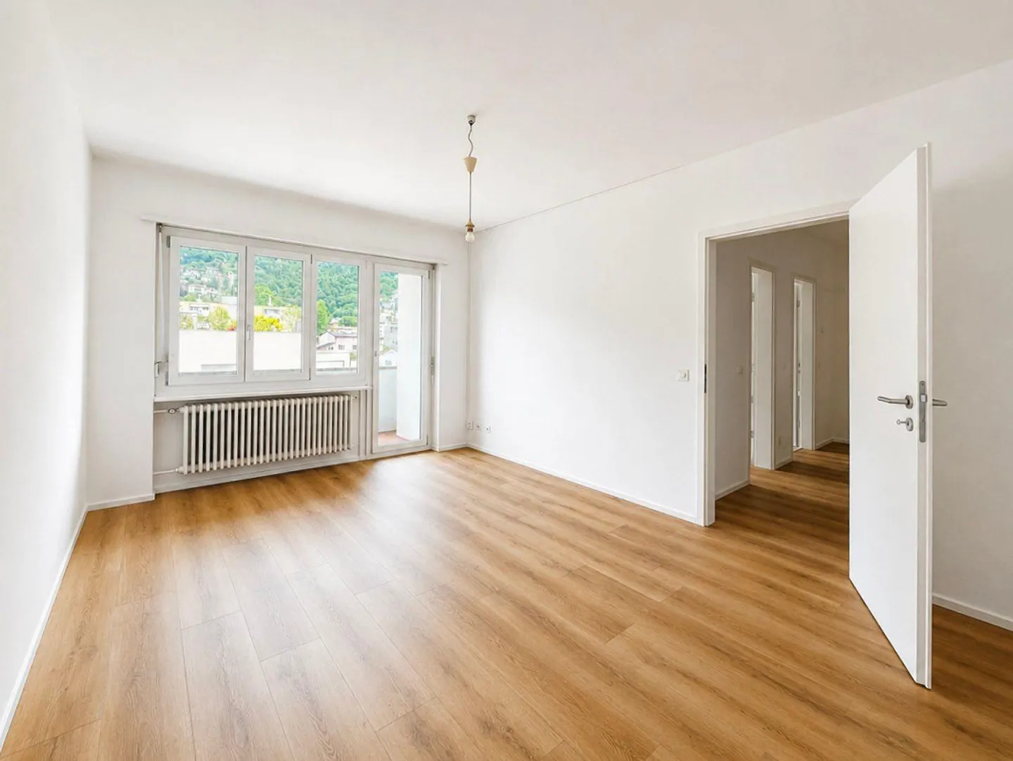 PREGASSONA - APPARTEMENT 2.5 CHAMBRES AVEC TERRASSE À LOUER - Photo 3 sur 6