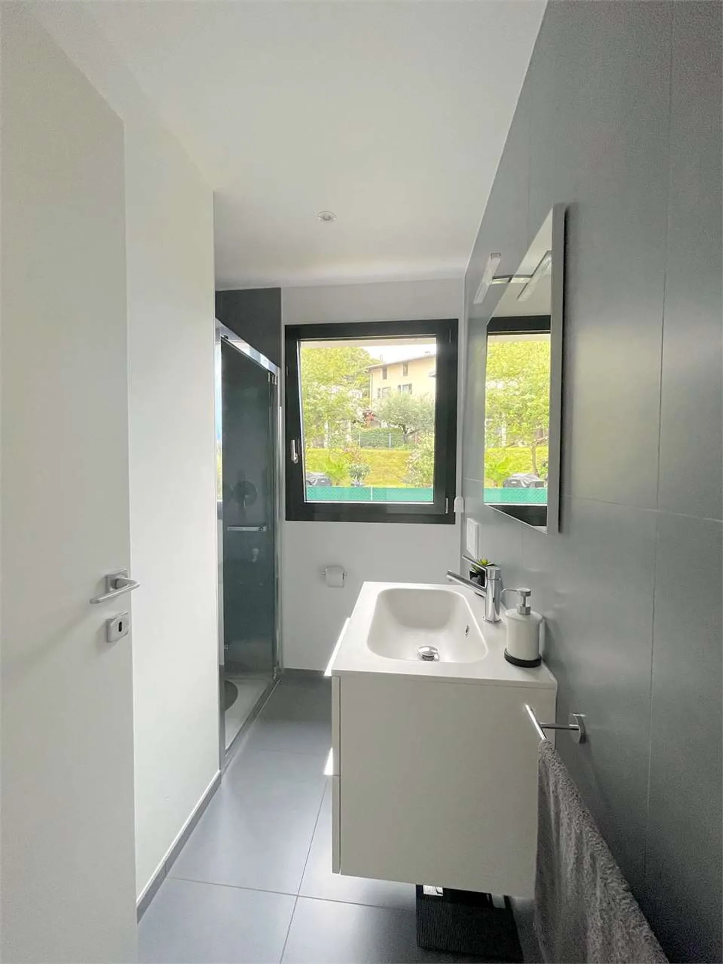 PIAZZOGNA - New 3.5-room apartment with garden and lake view - Photo 9 of 13