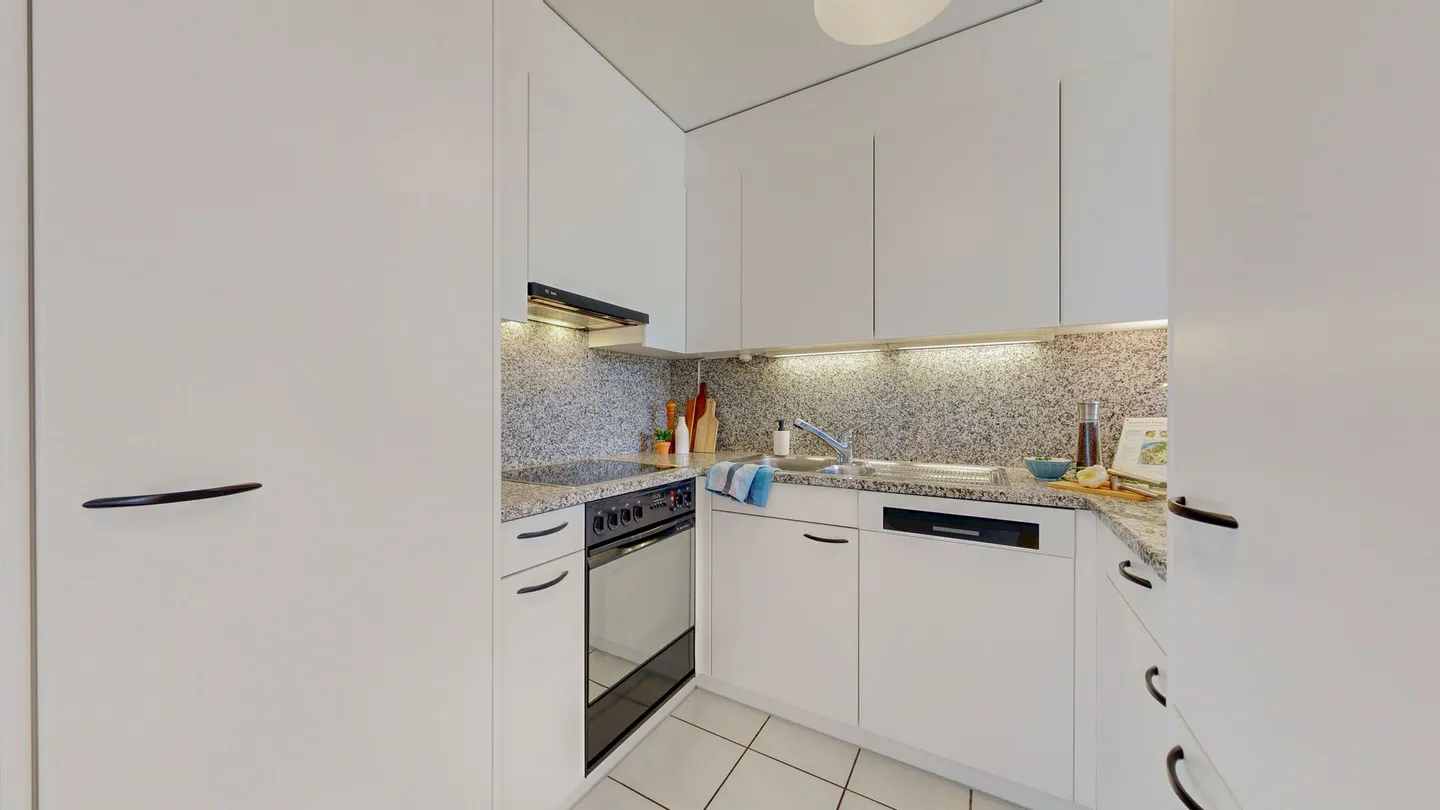 Charmant appartement 2.5 pièces - Photo 2 sur 8