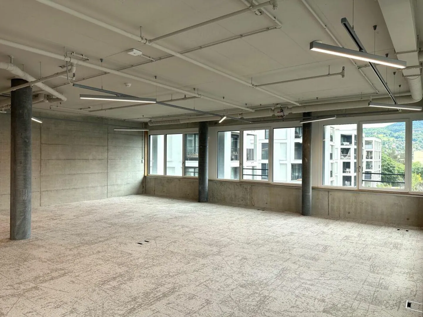 Geräumige Gewerbefläche mit 100m² - vielseitig nutzbar im Vivo Aesch - Foto 1 von 8